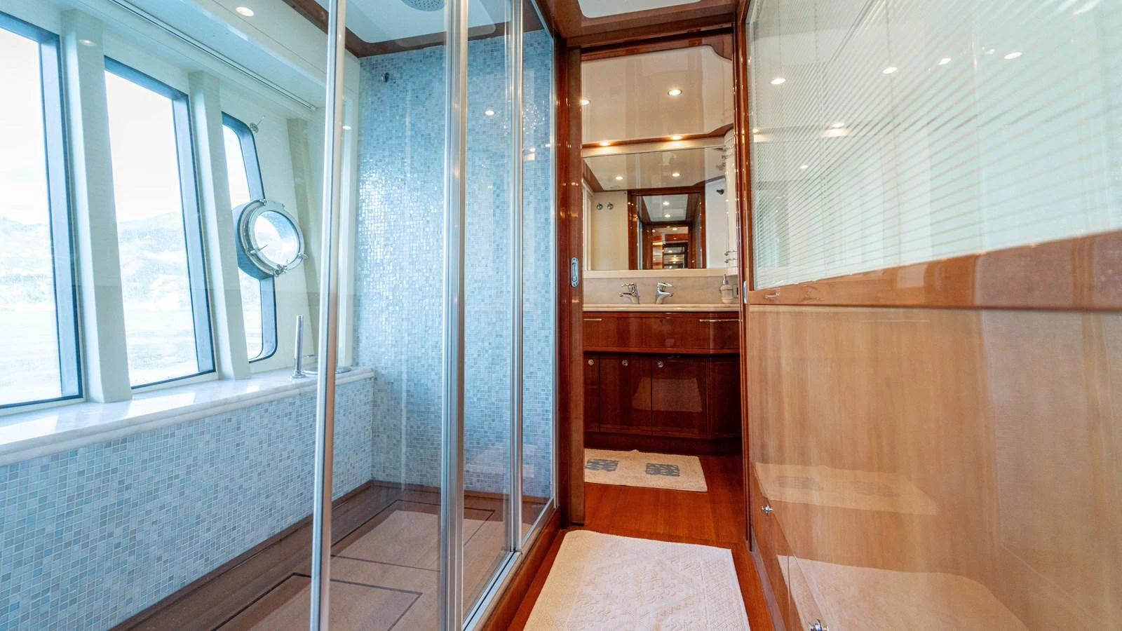 a room with a shower aboard LADY HELENA Yacht for Sale