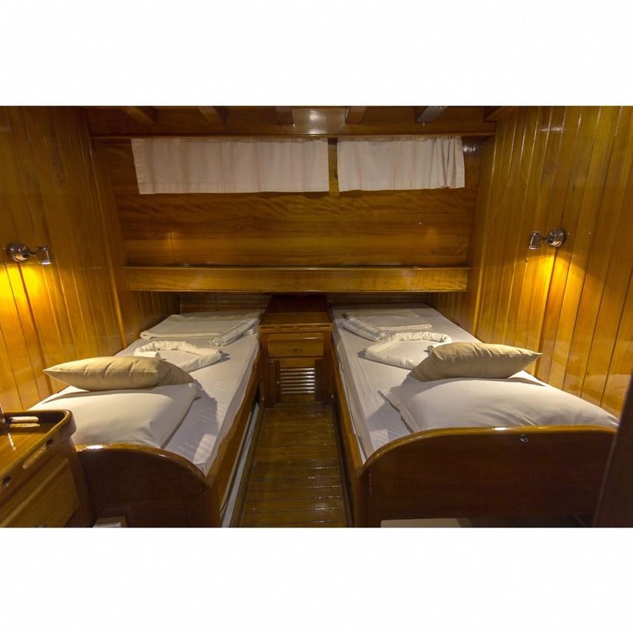 a room with bunk beds aboard NEMESIS Yacht for Sale