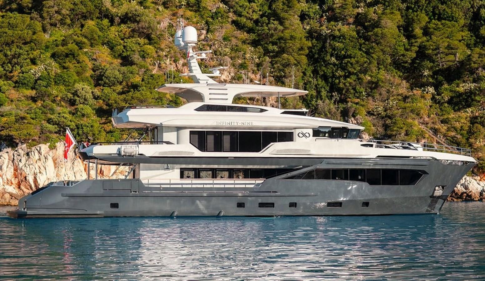 a large white yacht aboard INFINITY NINE Yacht for Sale