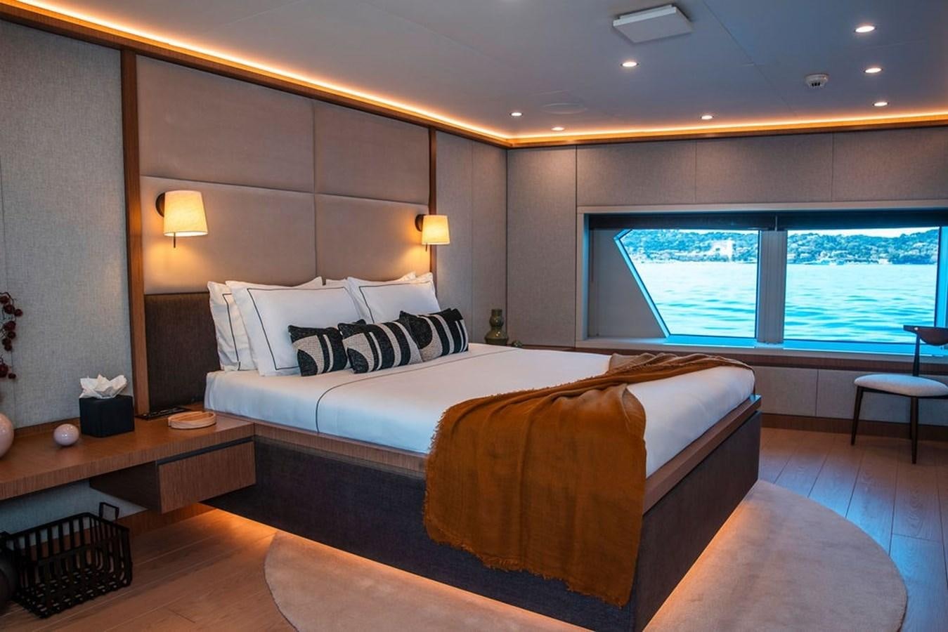 a large bed in a room aboard INFINITY NINE Yacht for Sale
