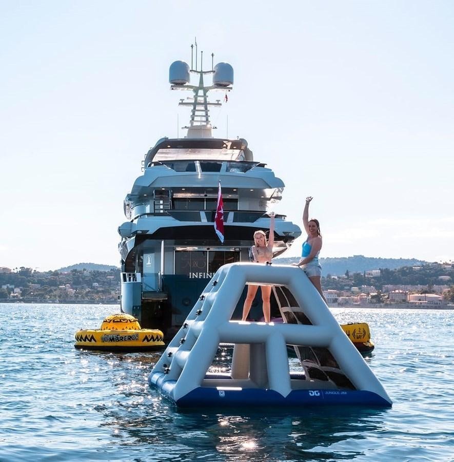 a boat with a person on it aboard INFINITY NINE Yacht for Sale