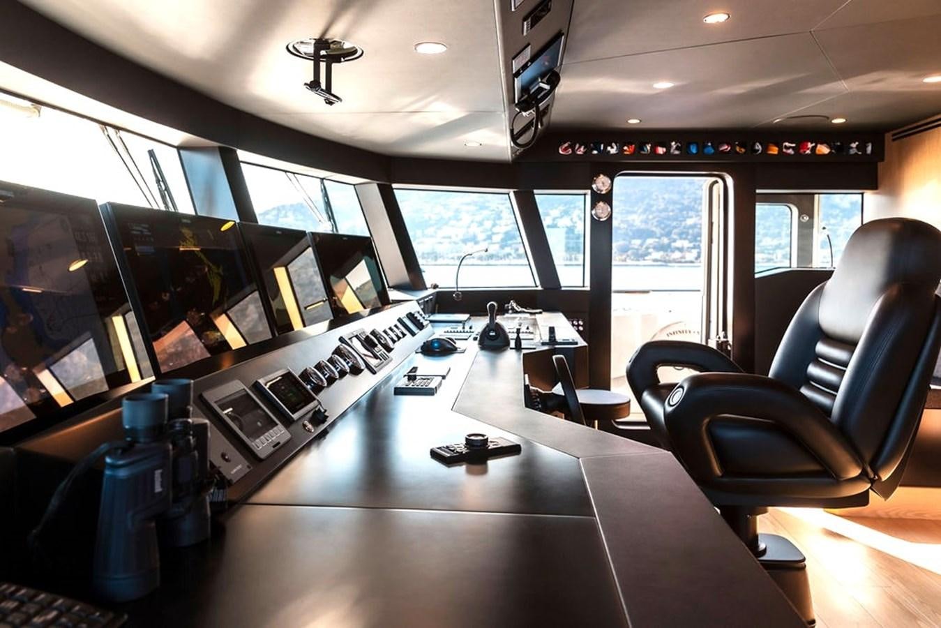 a control room with a large window aboard INFINITY NINE Yacht for Sale