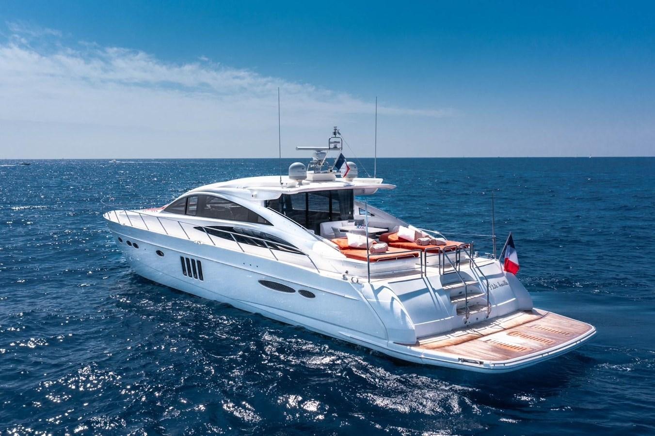 a white yacht in the water aboard PRINCESS V70 Yacht for Sale
