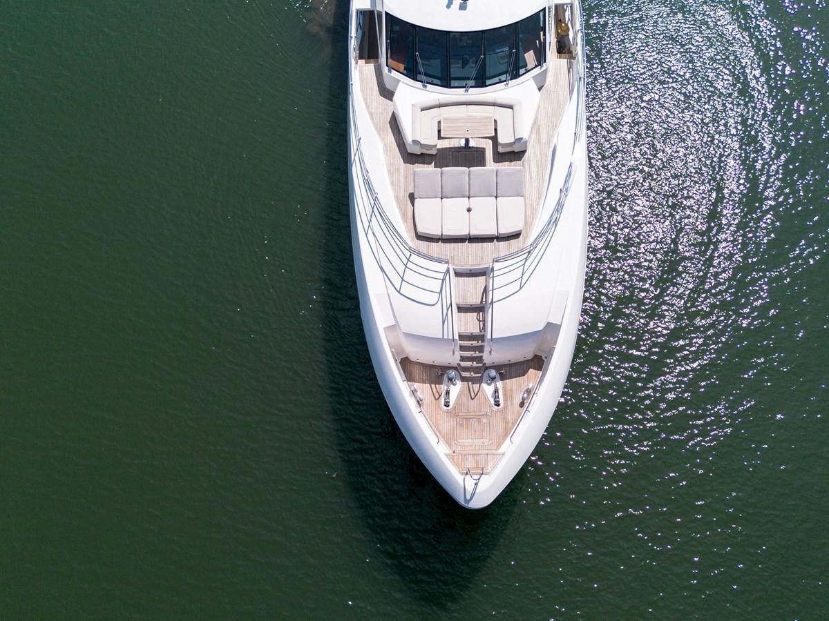 a white boat on water aboard M5 Yacht for Sale