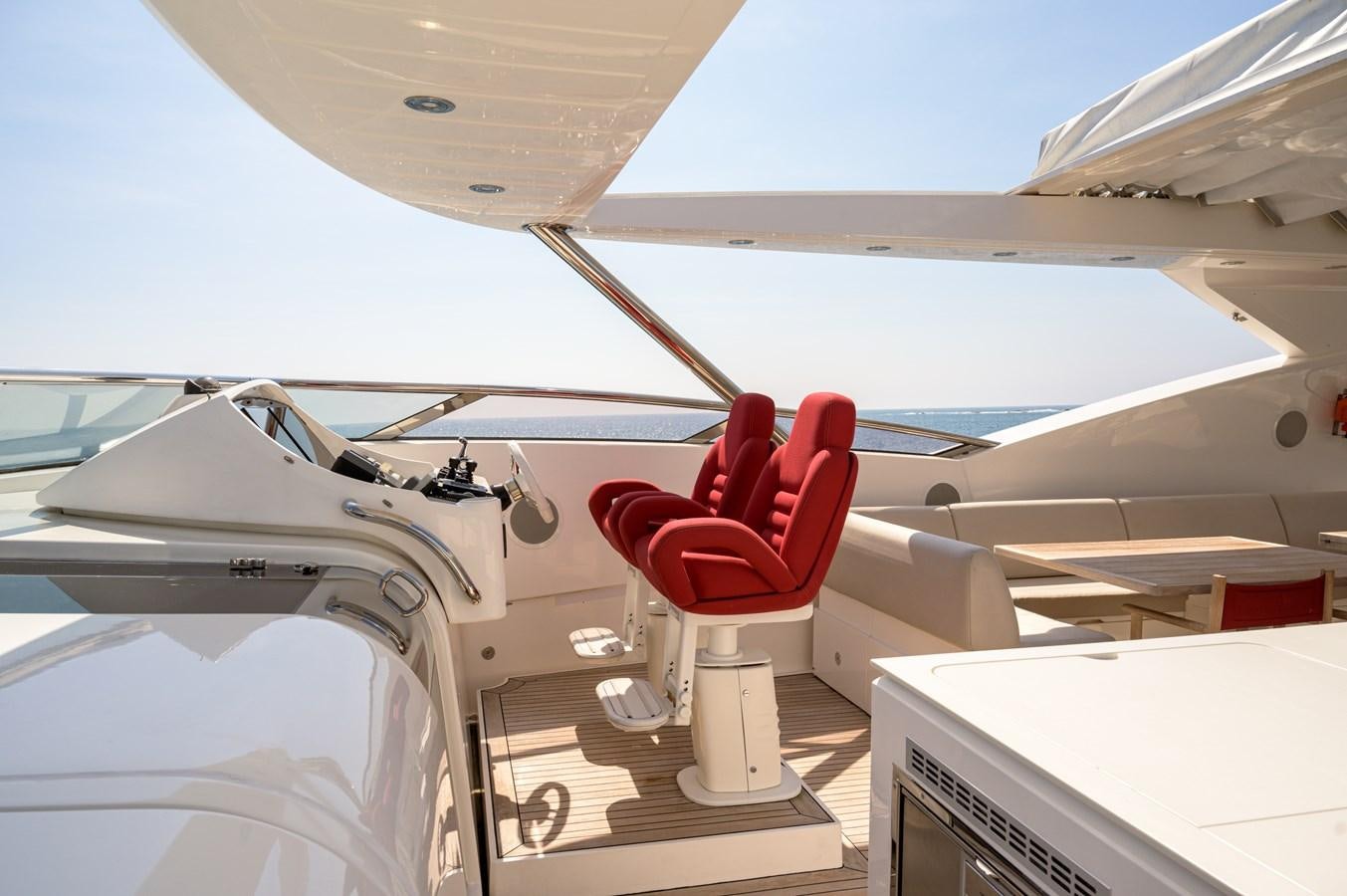a red bow on a plane aboard M5 Yacht for Sale