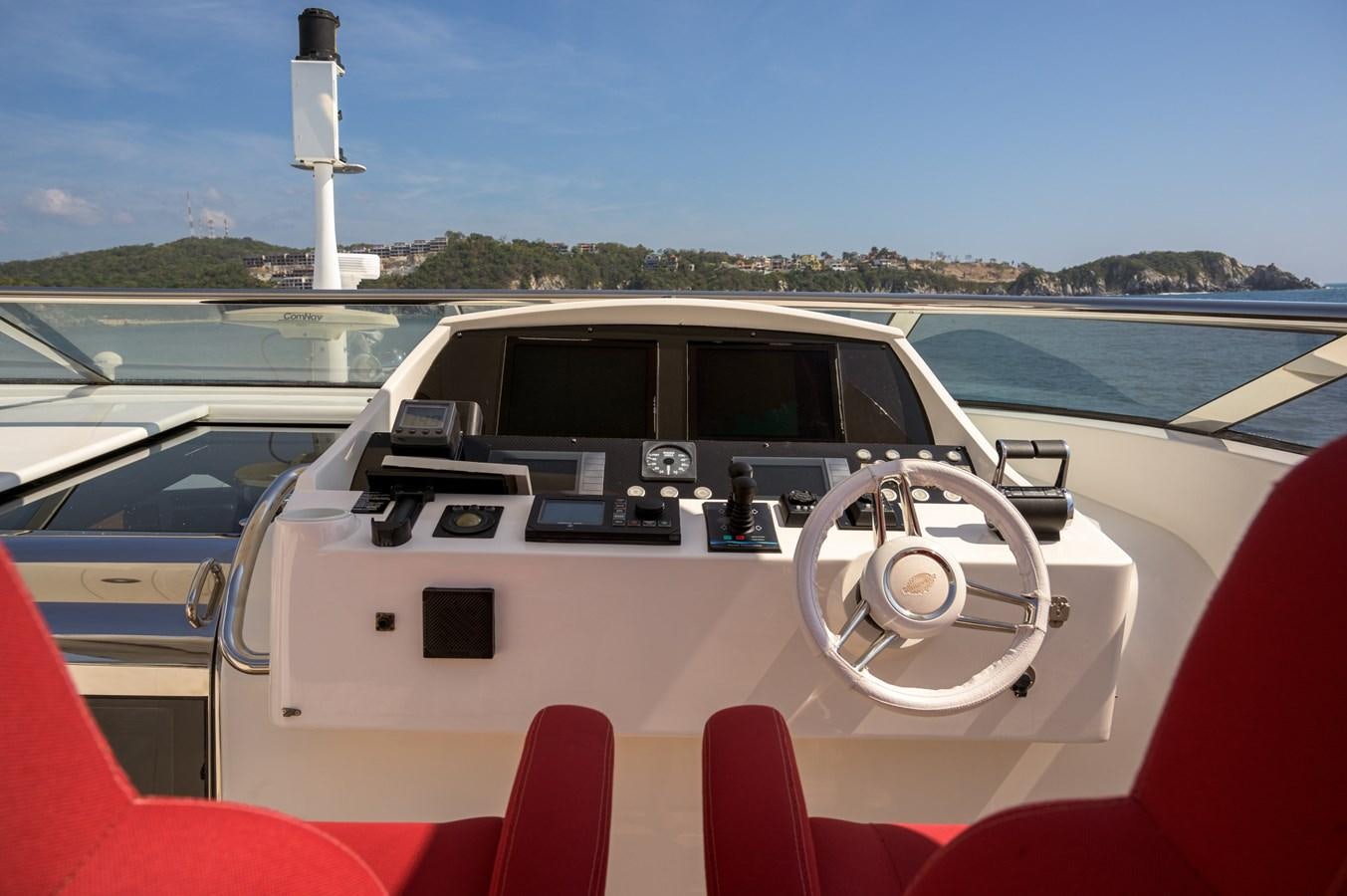 the inside of a car aboard M5 Yacht for Sale