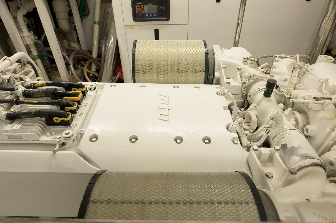 a machine with a large piece of equipment on it aboard M5 Yacht for Sale