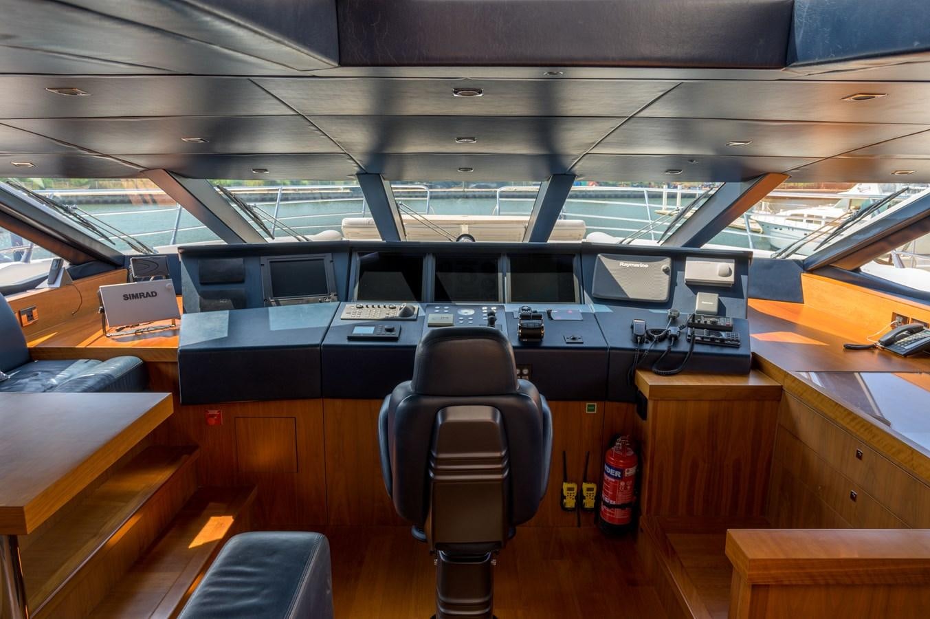 a room with a large black object on the ceiling aboard M5 Yacht for Sale
