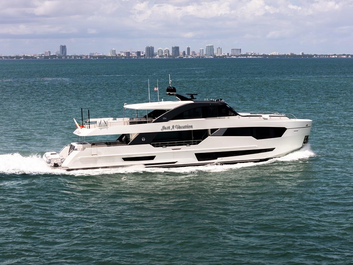 a white yacht in the water aboard JUST A VACATION Yacht for Sale