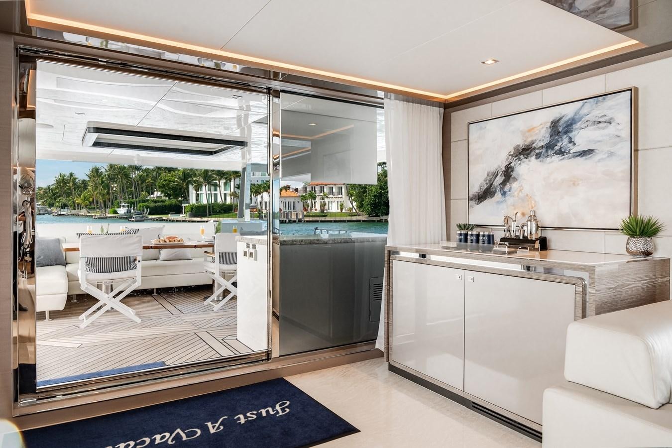 a modern looking living room aboard JUST A VACATION Yacht for Sale