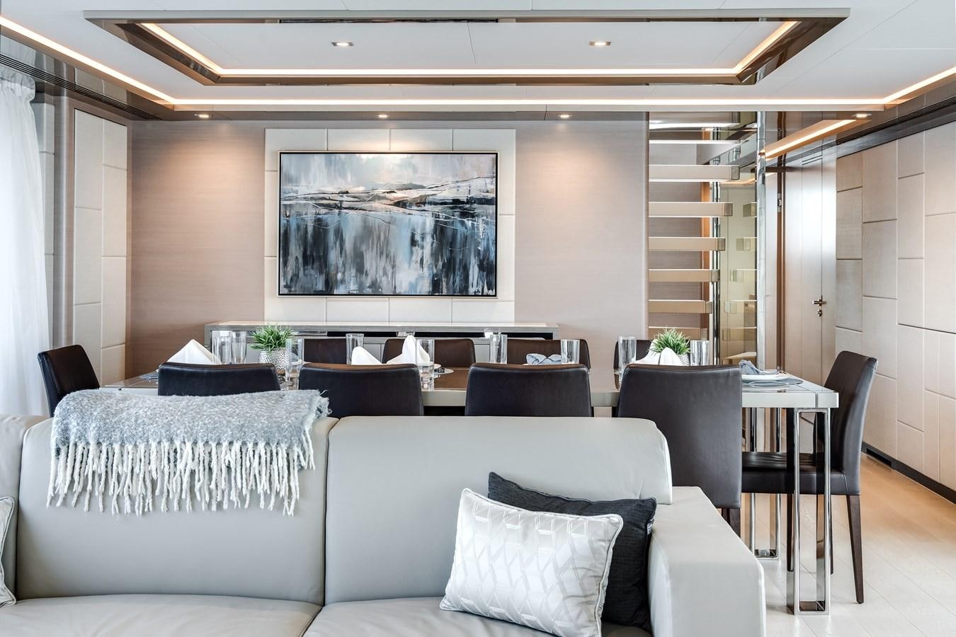 a room with a couch and chairs aboard JUST A VACATION Yacht for Sale