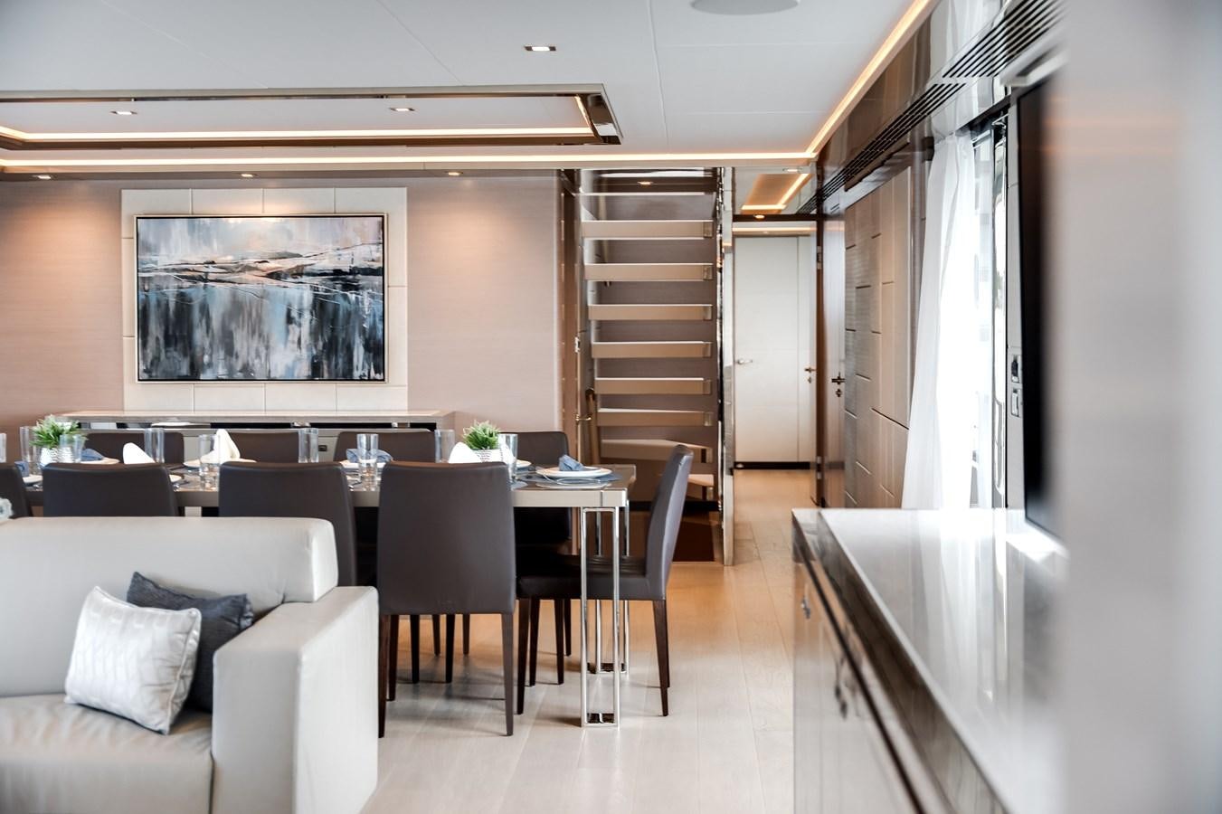 a room with a couch and chairs aboard JUST A VACATION Yacht for Sale