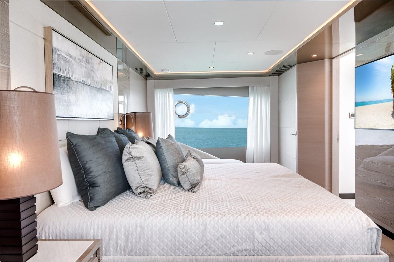 a bed with pillows on it aboard JUST A VACATION Yacht for Sale