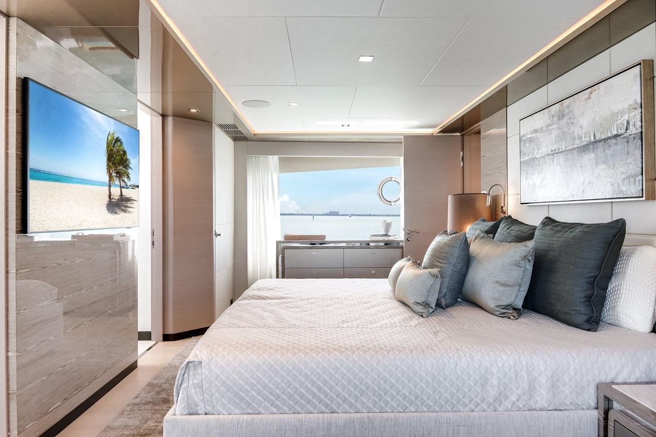 a bedroom with a large bed aboard JUST A VACATION Yacht for Sale