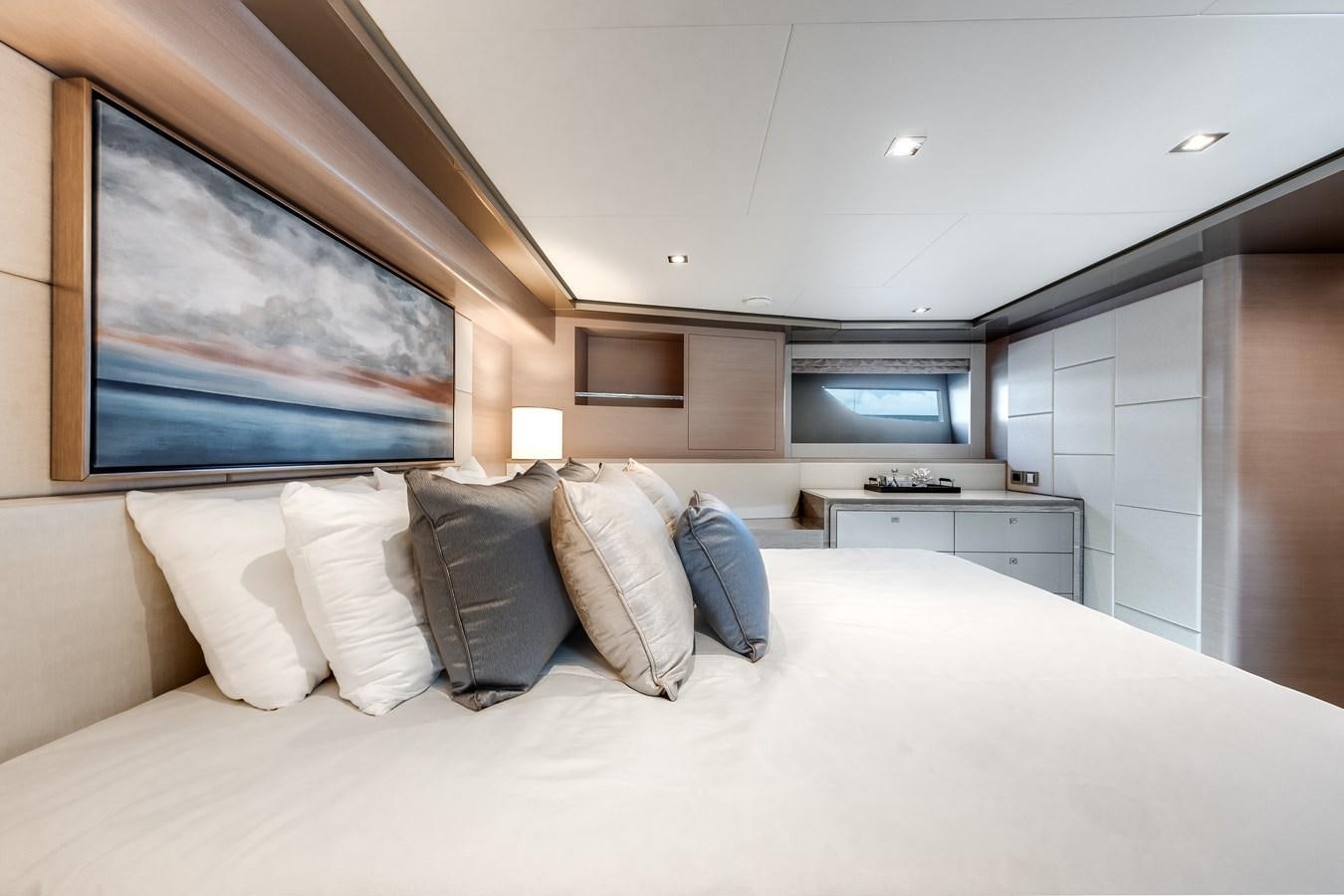 a bed with pillows and pillows aboard JUST A VACATION Yacht for Sale
