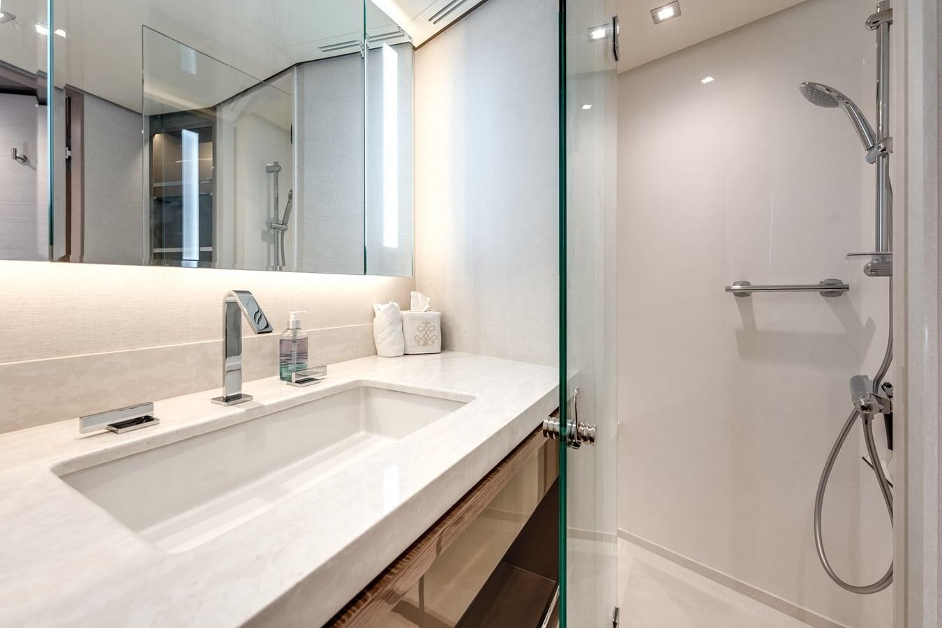 a bathroom with a sink and a shower aboard JUST A VACATION Yacht for Sale