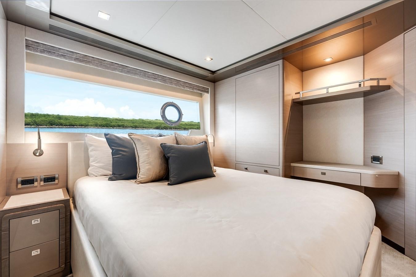 a bed in a room aboard JUST A VACATION Yacht for Sale