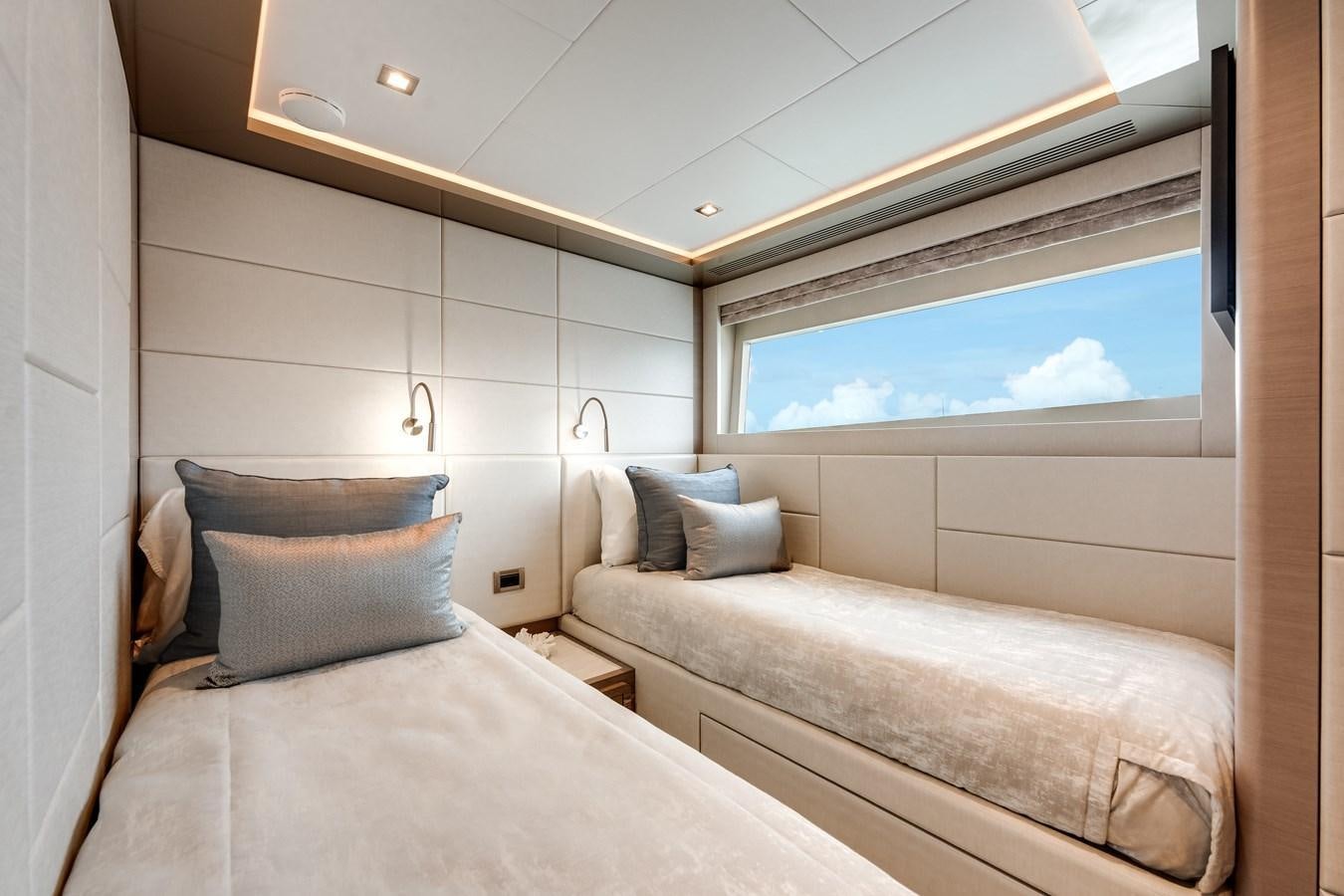 a room with two beds aboard JUST A VACATION Yacht for Sale