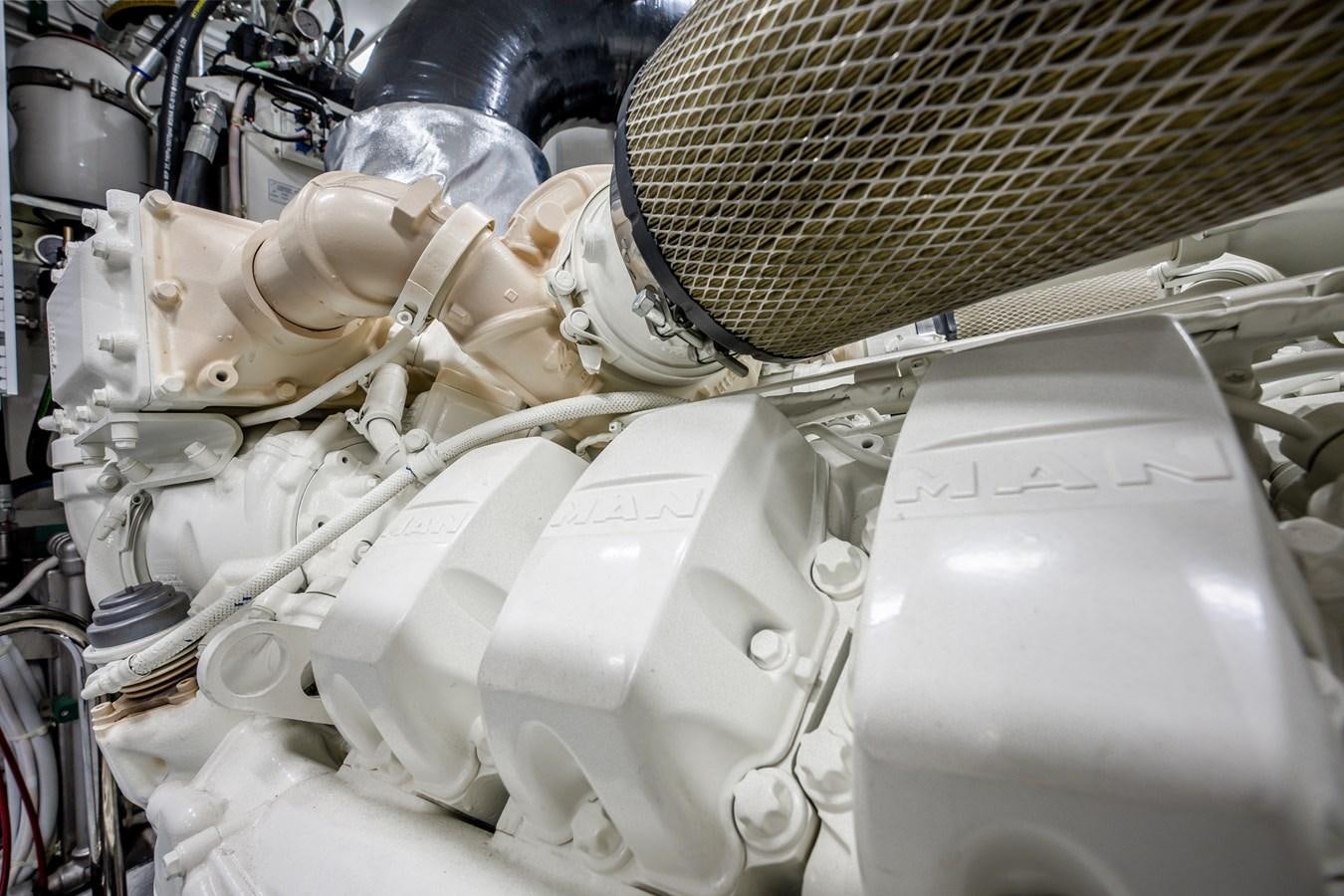 a machine with a large metal cylinder aboard JUST A VACATION Yacht for Sale