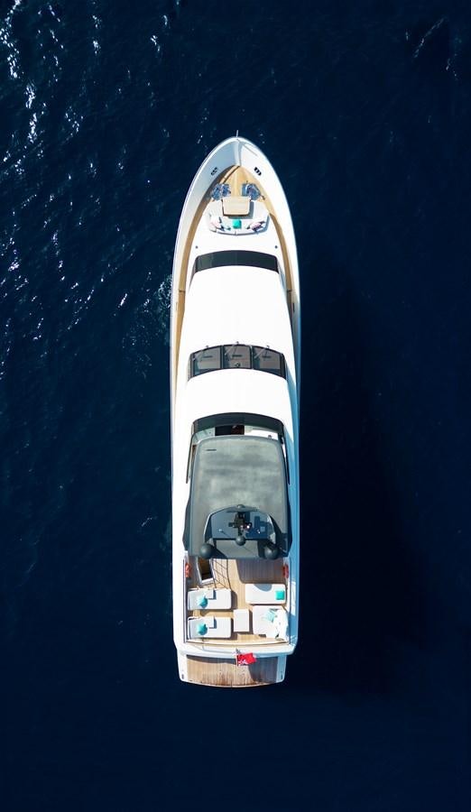 a white and gold boat in water aboard CYBELE Yacht for Sale