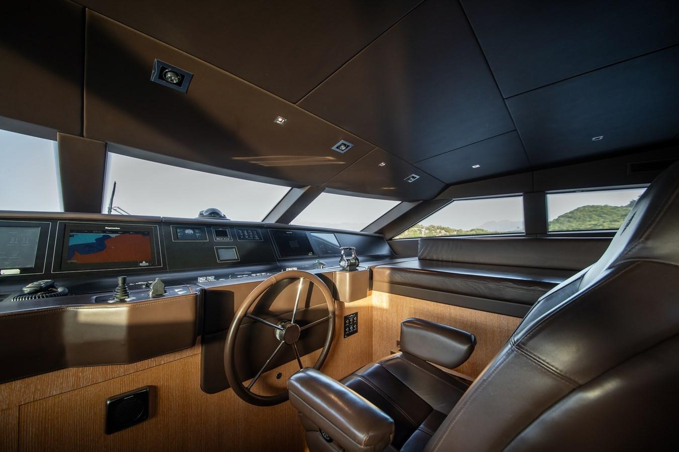 inside of a car aboard CYBELE Yacht for Sale