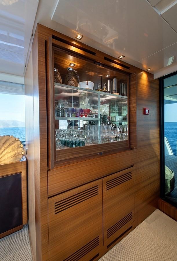 a glass case with a shelf aboard CYBELE Yacht for Sale