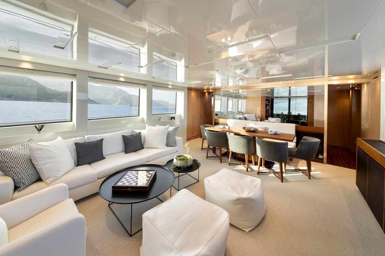 a living room with a large window aboard CYBELE Yacht for Sale