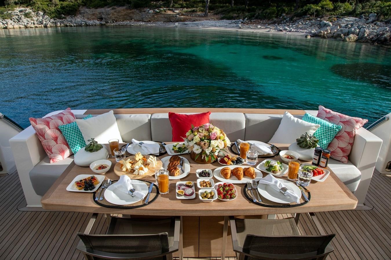 a table with food on it aboard CYBELE Yacht for Sale