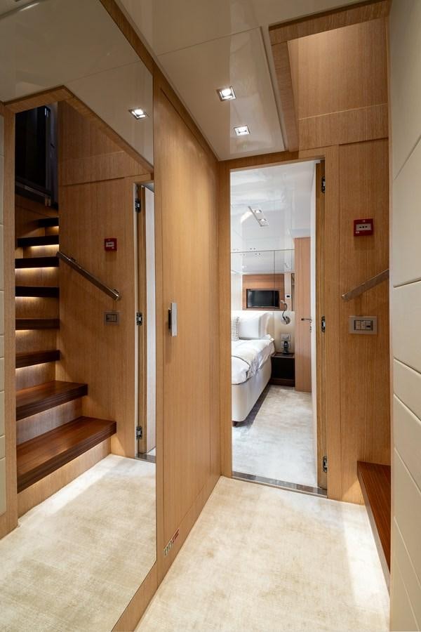 a bathroom with a wood door aboard CYBELE Yacht for Sale