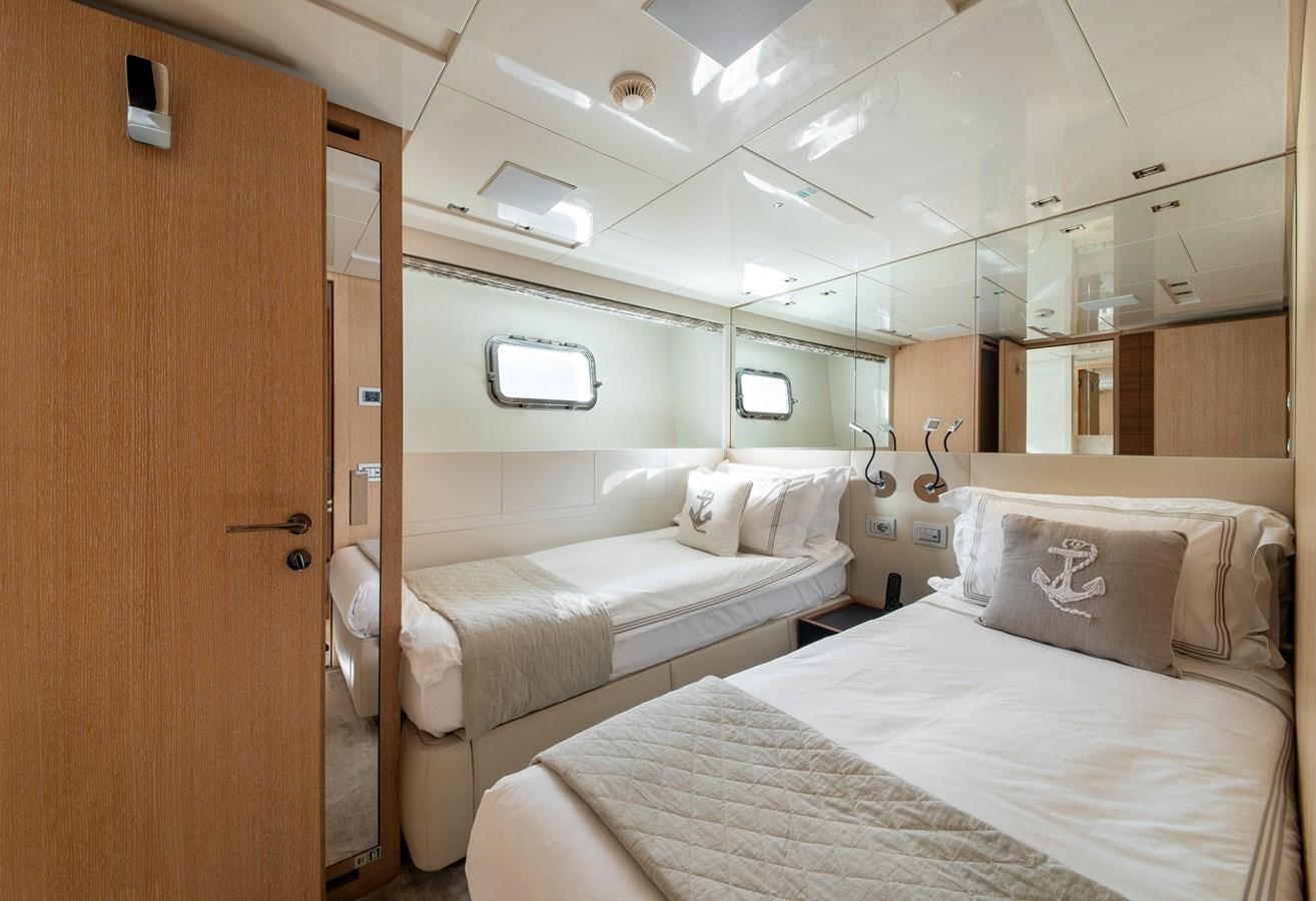 a room with two beds aboard CYBELE Yacht for Sale