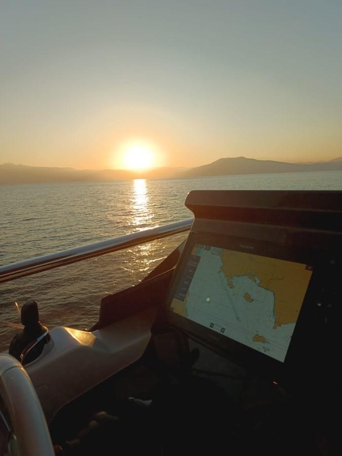 a person sitting on a boat aboard BELLA MIA Yacht for Sale