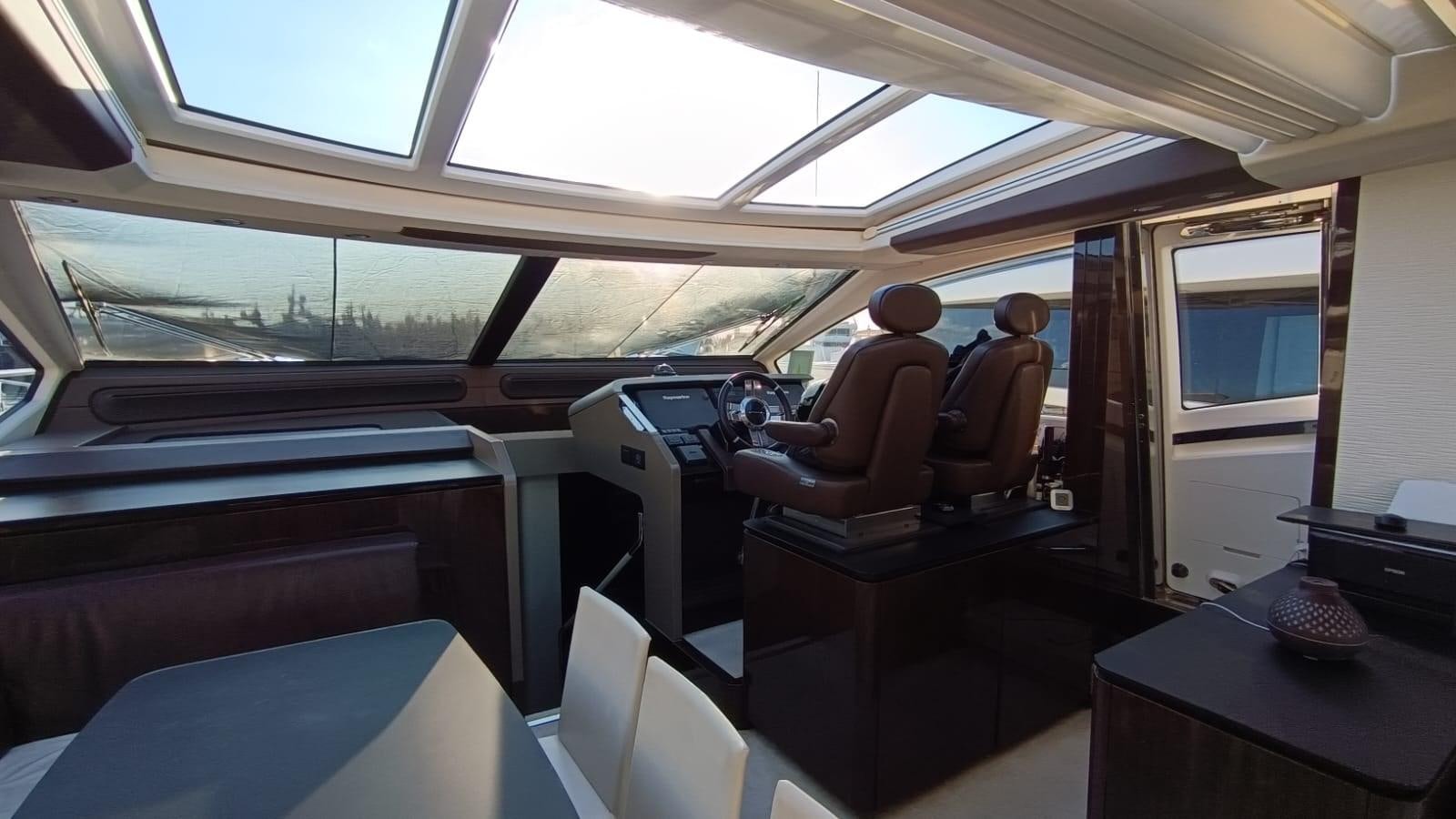 a person sitting in a vehicle aboard BELLA MIA Yacht for Sale