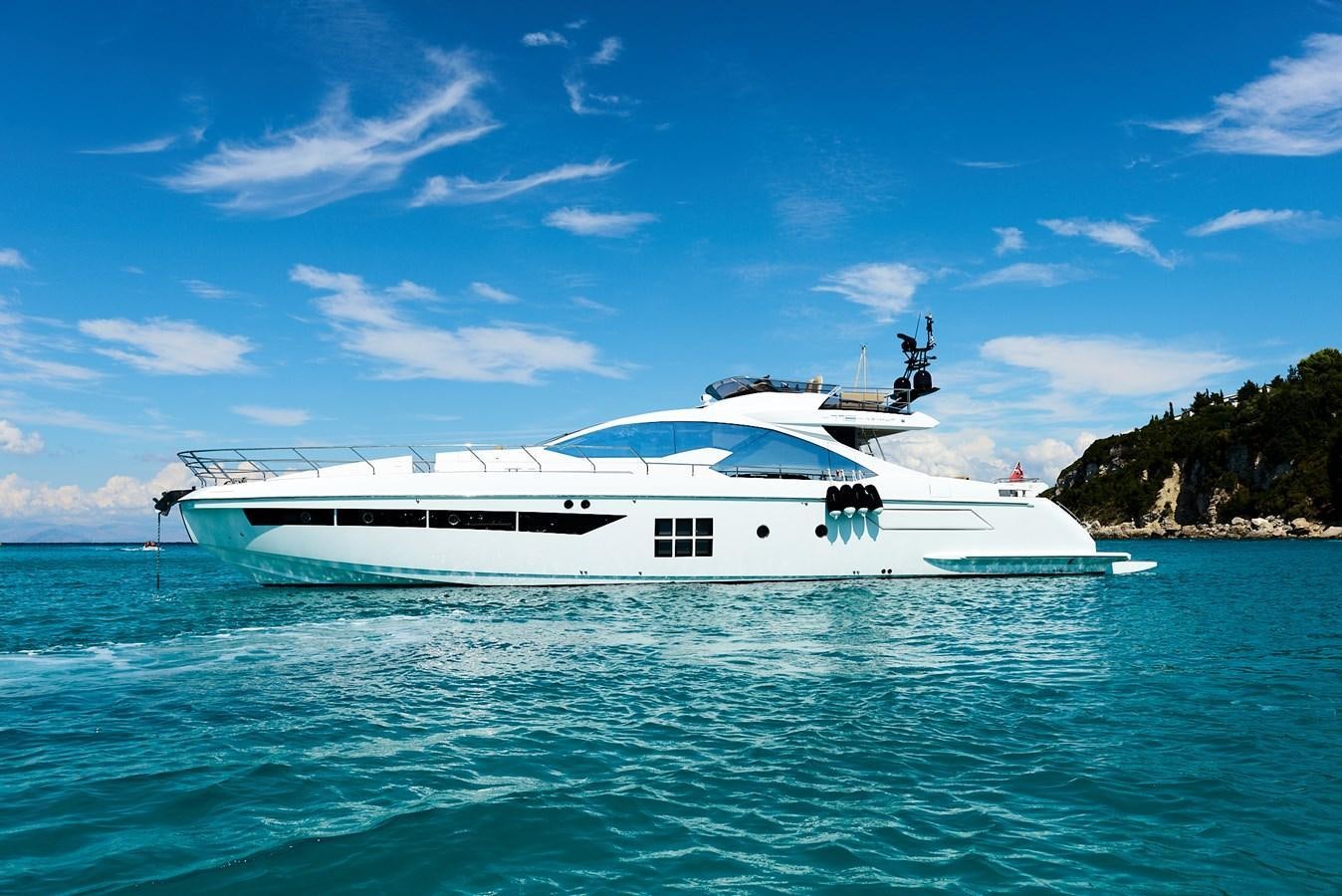 a white boat in the water aboard BELLA MIA Yacht for Sale