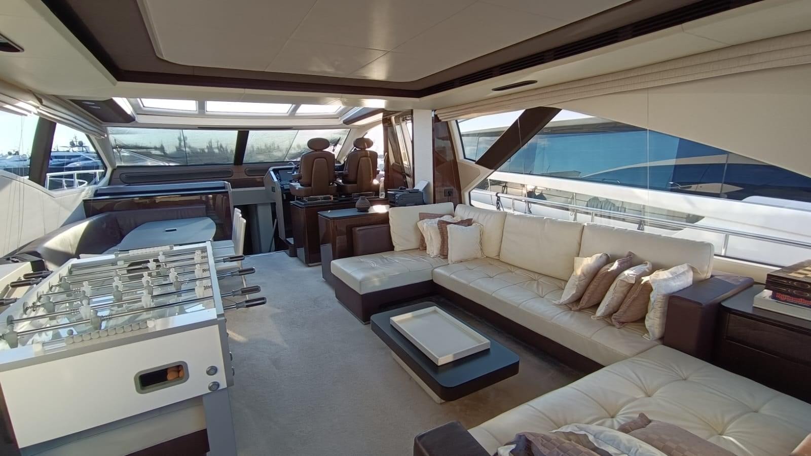 a room with a bed and a table aboard BELLA MIA Yacht for Sale