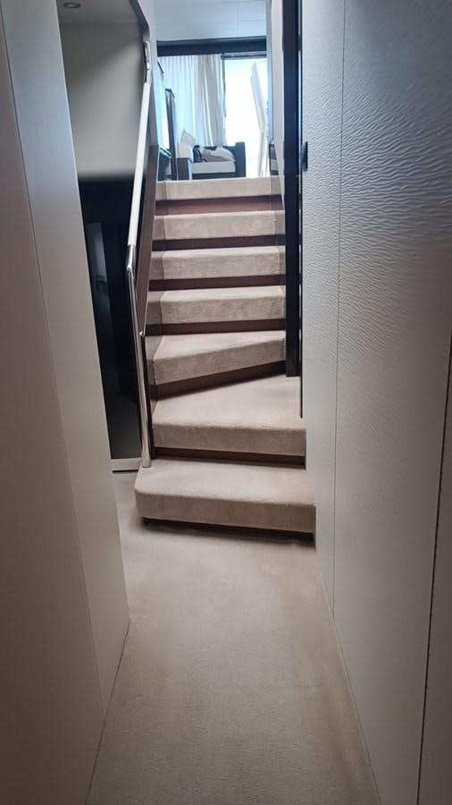 a set of stairs in a room aboard BELLA MIA Yacht for Sale