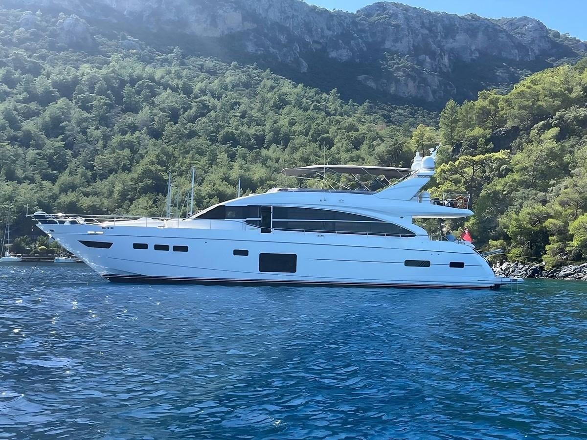 a white yacht in the water aboard MS FELICE Yacht for Sale