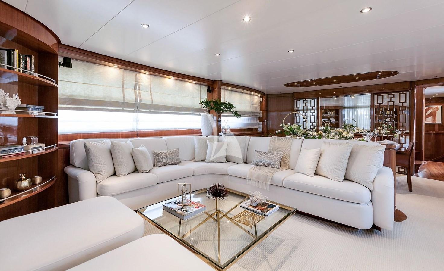 a living room with a white couch aboard SL88 Yacht for Sale