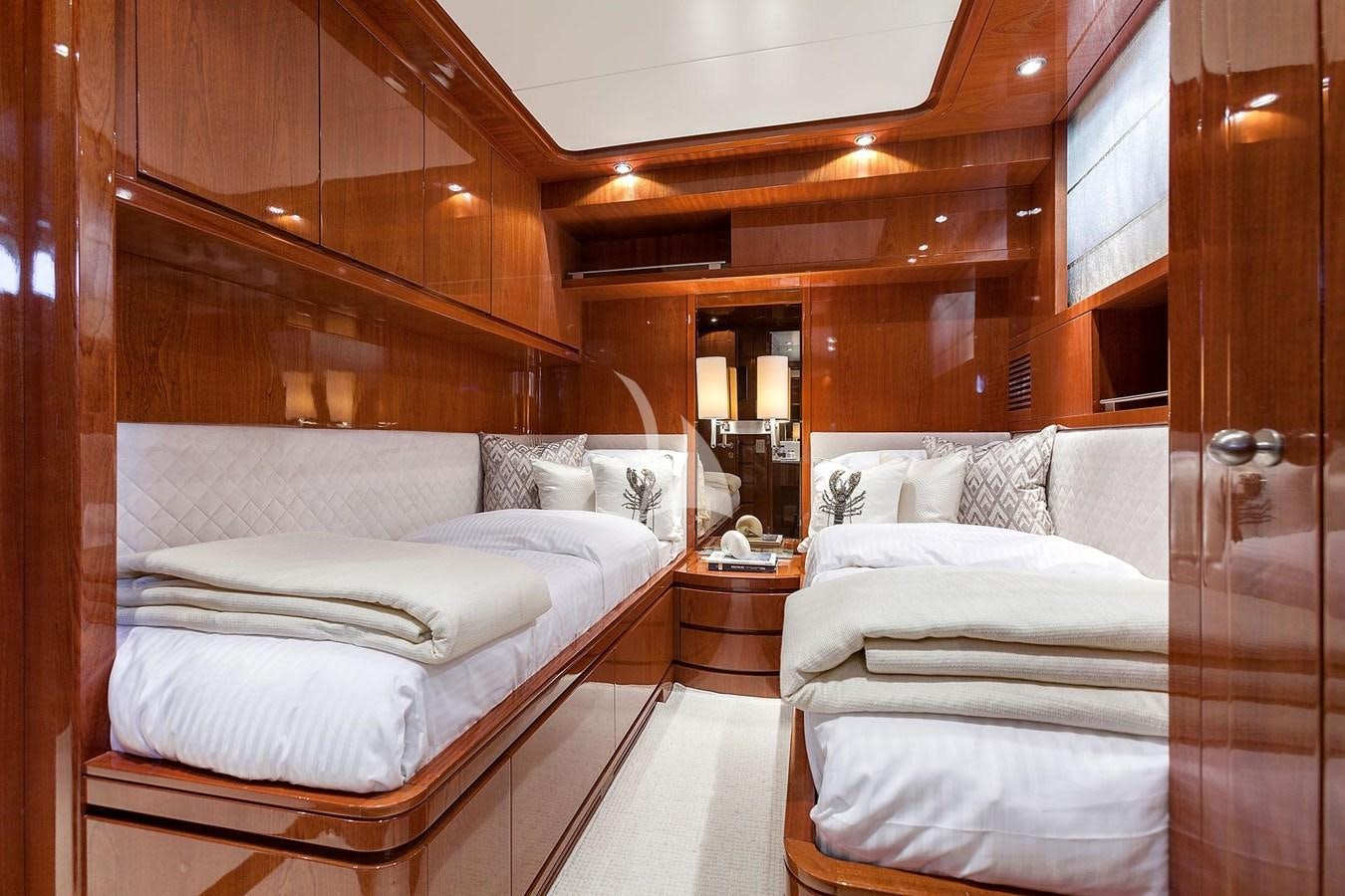a room with a bed and a mirror aboard SL88 Yacht for Sale