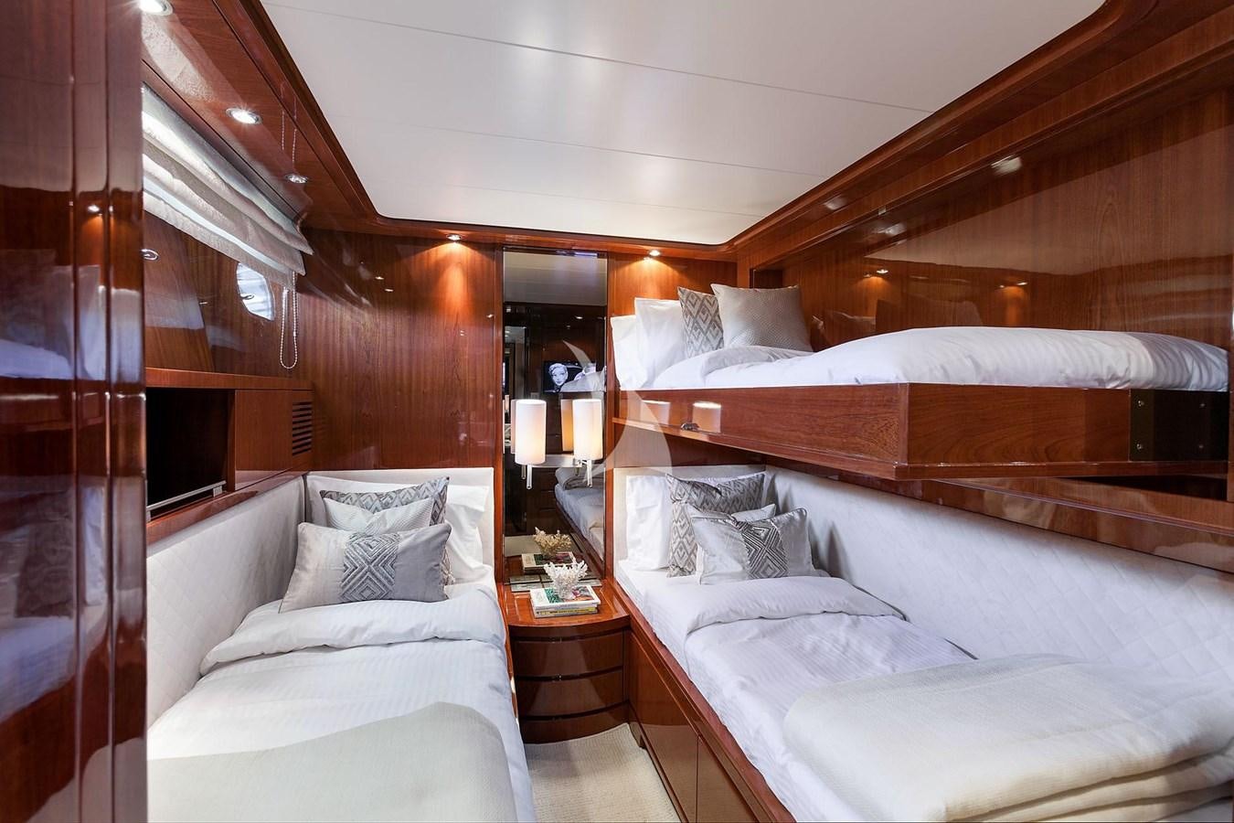 a room with a bed and a mirror aboard SL88 Yacht for Sale