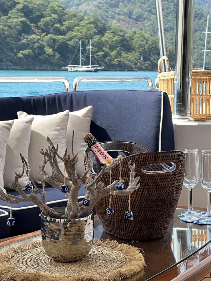 a vase with a spoon in it aboard FRIENDSHIP Yacht for Sale