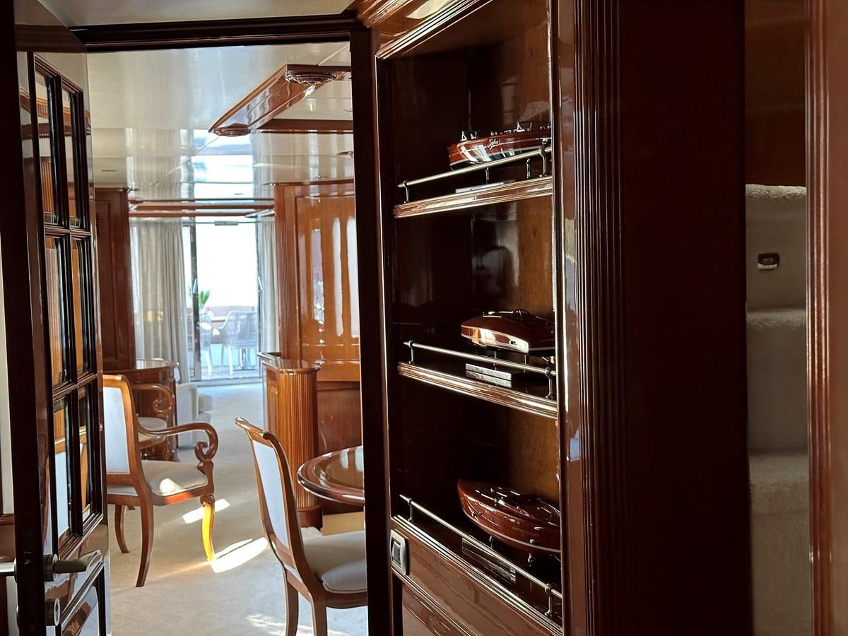 a room with a closet and chairs aboard FRIENDSHIP Yacht for Sale