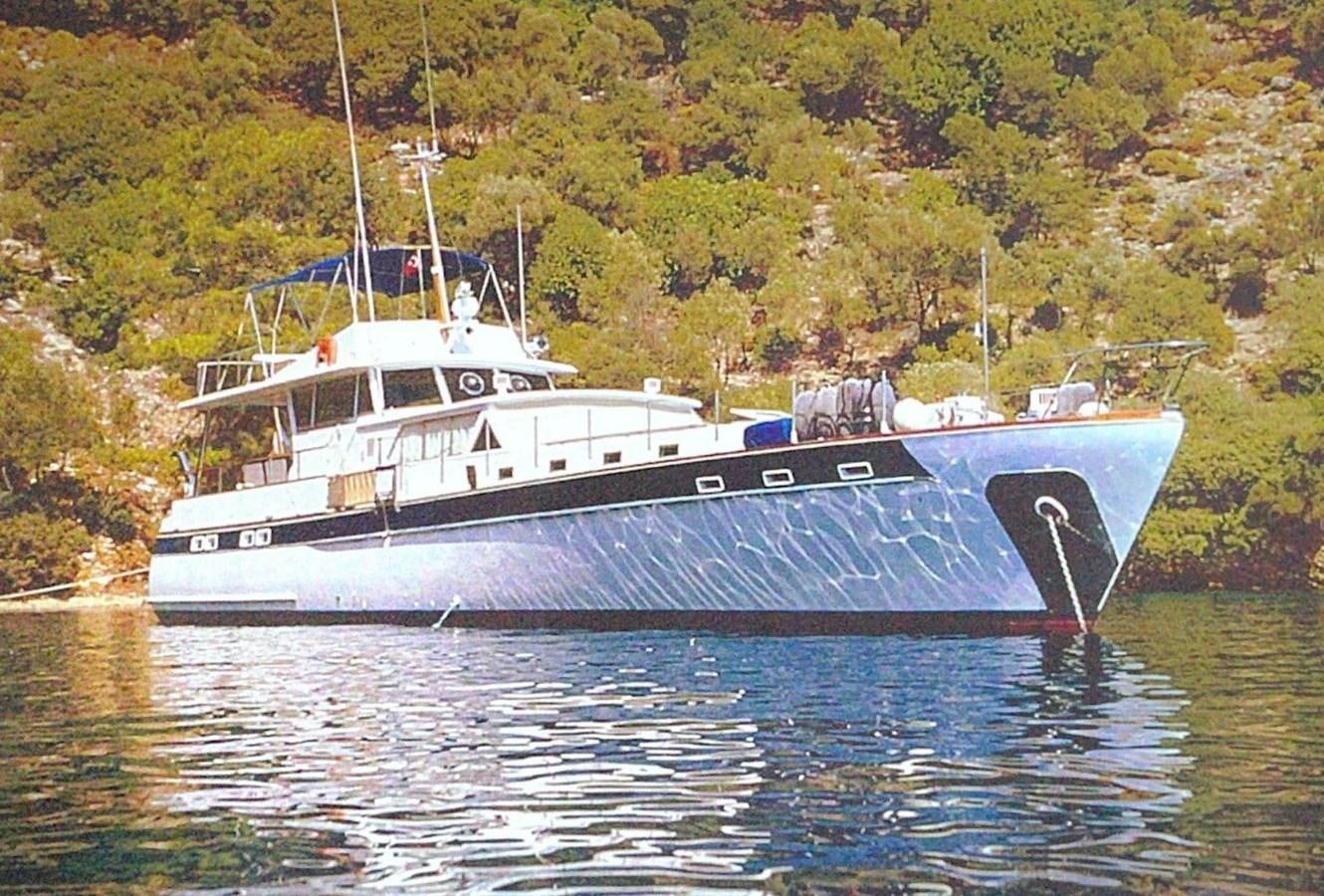 a boat on the water aboard LA BOUFFONNE Yacht for Sale