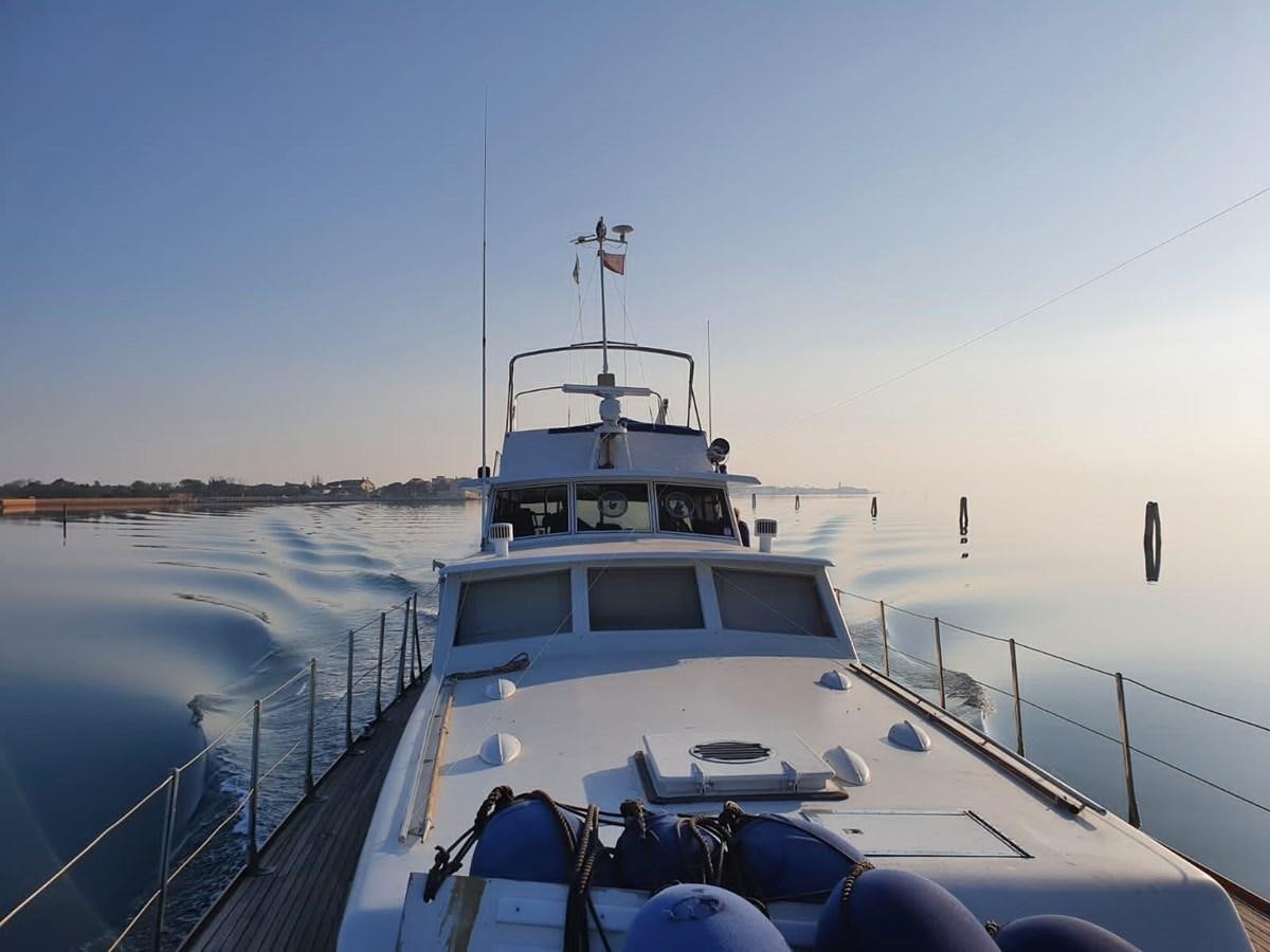 a boat on the water aboard LA BOUFFONNE Yacht for Sale