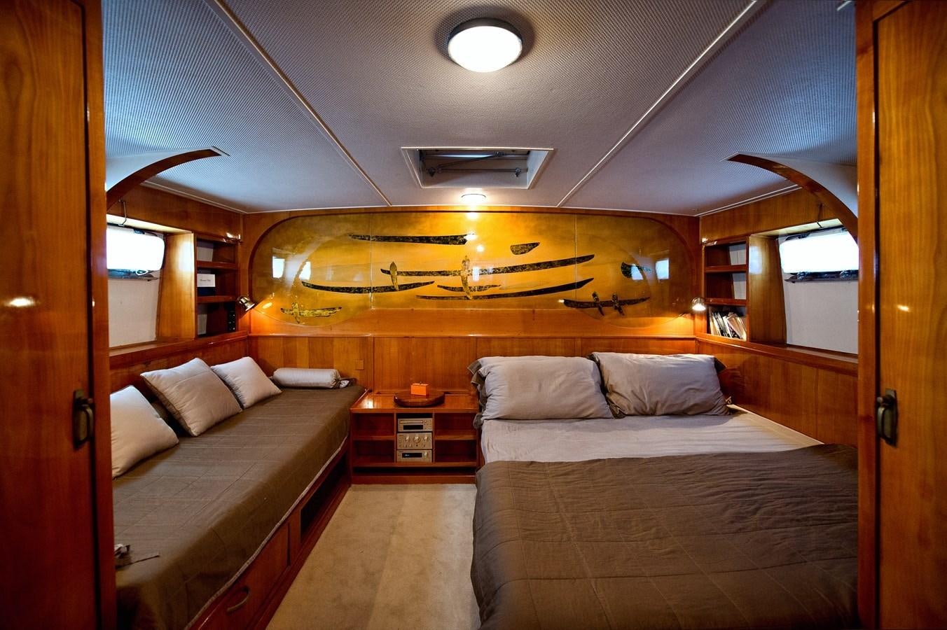a room with two beds aboard LA BOUFFONNE Yacht for Sale
