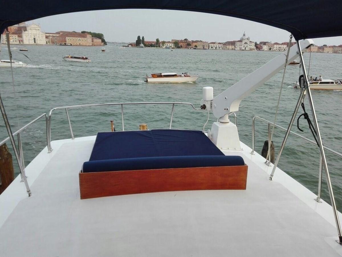 a boat on the water aboard LA BOUFFONNE Yacht for Sale