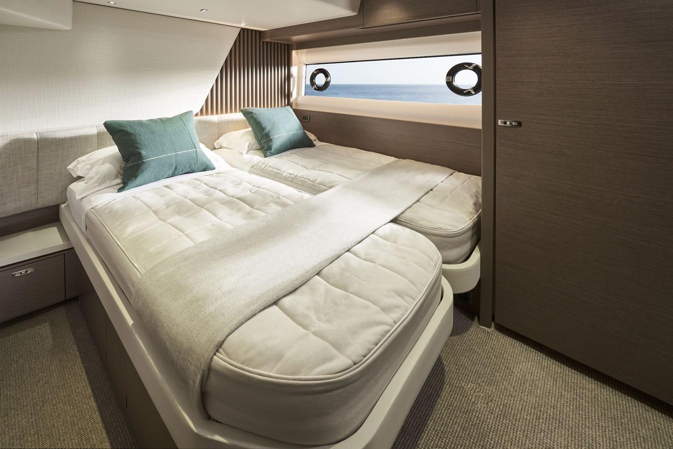 a room with two beds aboard SPIRIT OF RIO Yacht for Sale