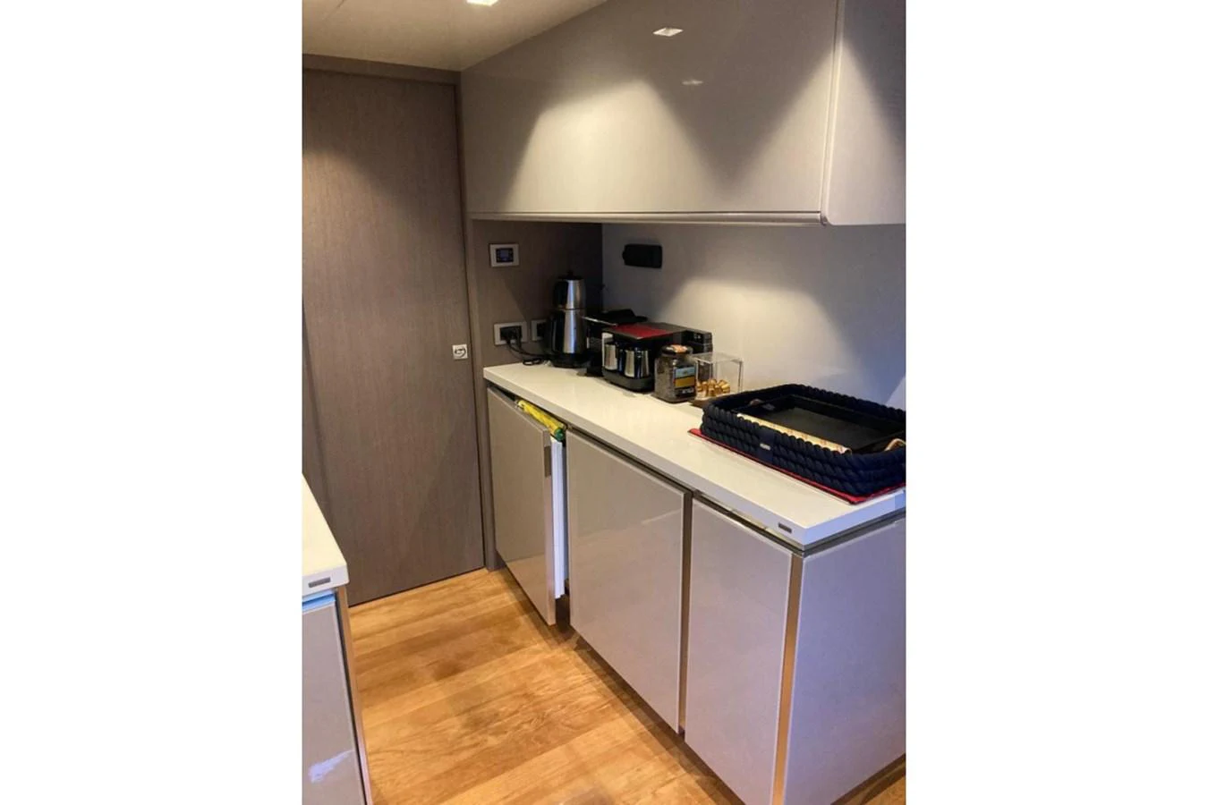 The galley features modern appliances and sleek cabinetry, perfect for onboard culinary experiences. aboard HAPPY 2 Yacht for Sale