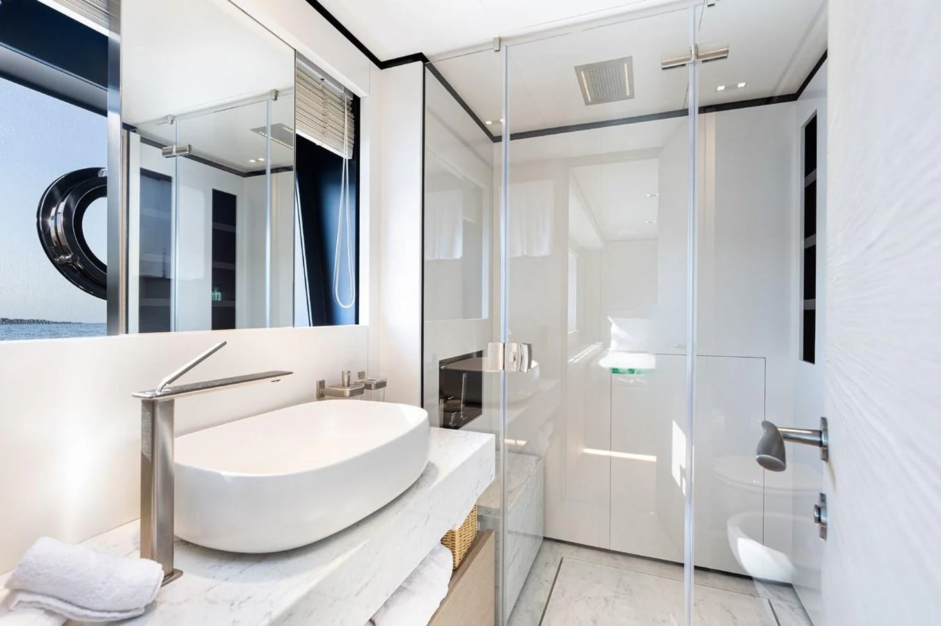 a bathroom with a sink and a shower aboard HAIAMI I Yacht for Sale