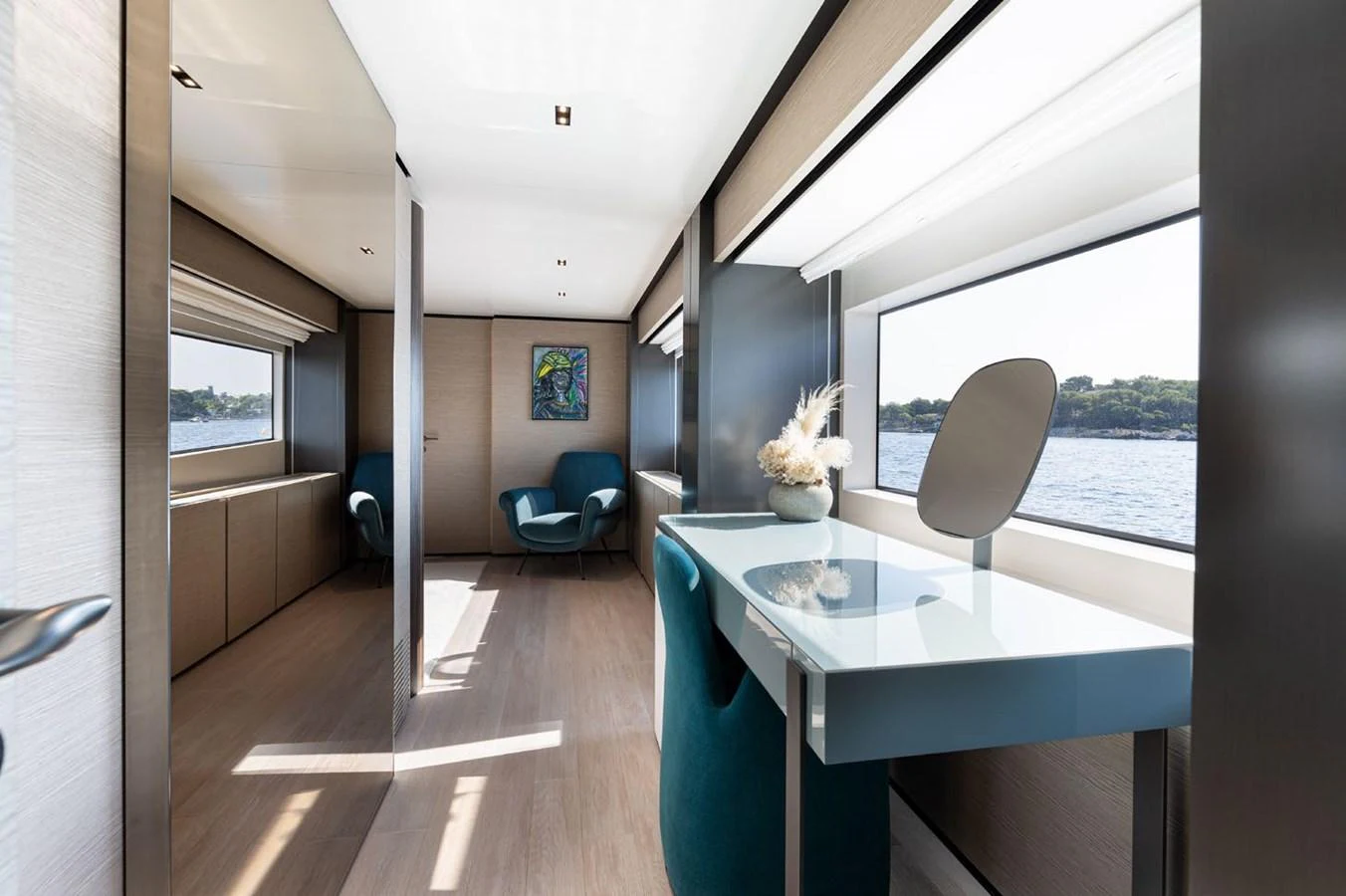 a room with a table and chairs aboard HAIAMI I Yacht for Sale