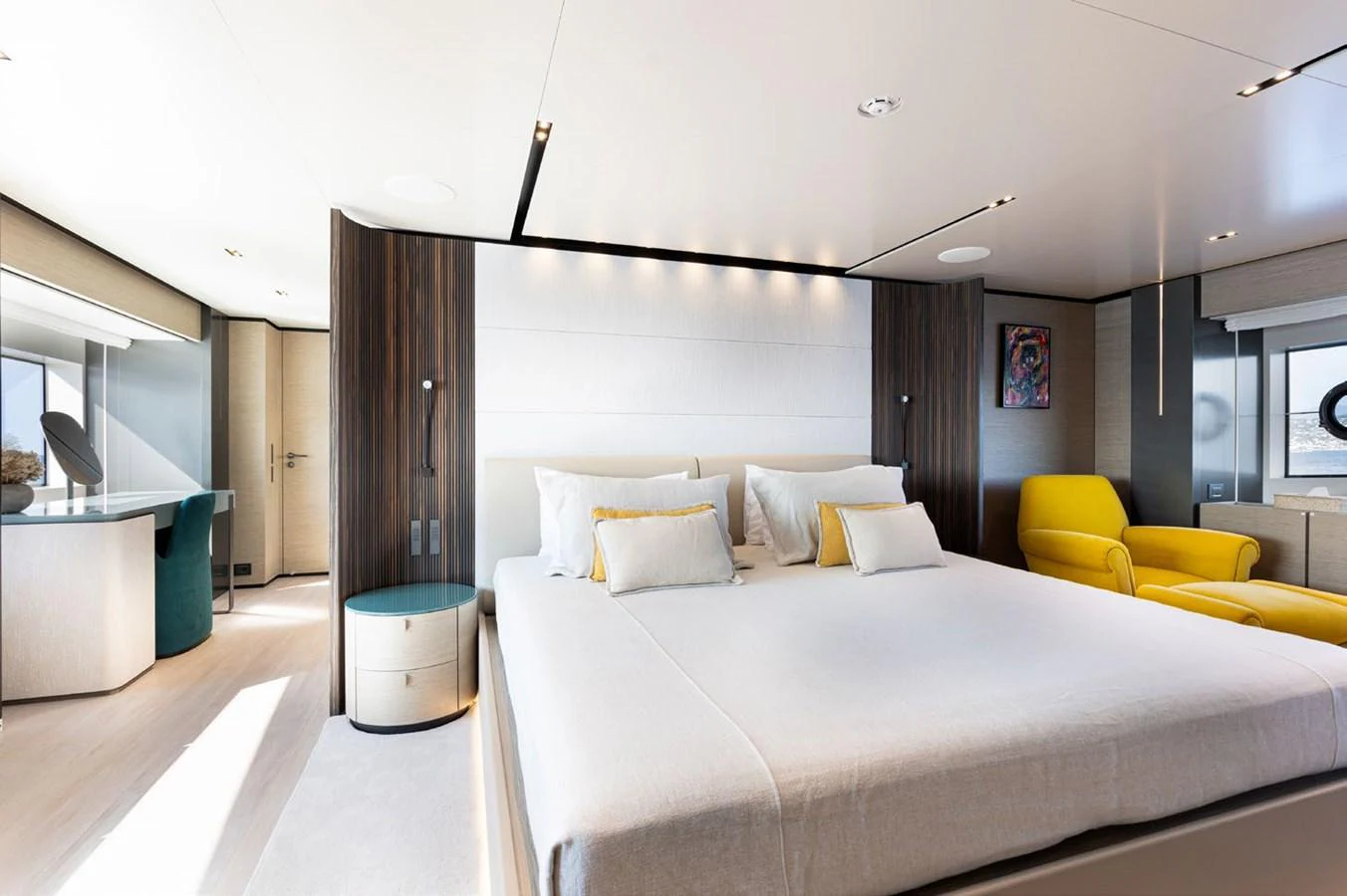 a large bedroom with a large bed aboard HAIAMI I Yacht for Sale